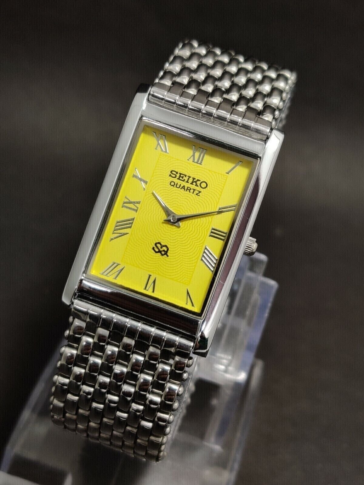 Seiko Slim Rectangular Yellow Face SS Bracelet Mens Watch  