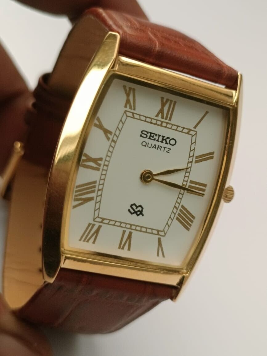 Seiko Slim Quartz White Face Tan Band Men's Wrist Watch A52