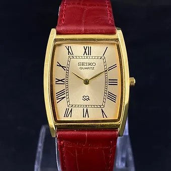 Seiko Slim Barrel Golden Face Red Band Mens watch A0106