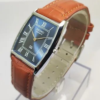 Seiko Slim Barrel Blue Face Brown Band Mens watch A0124