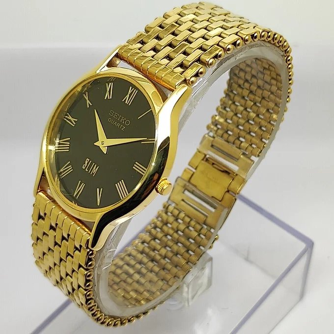 Seiko Slim Round Black Face Golden Band Mens watch AR03