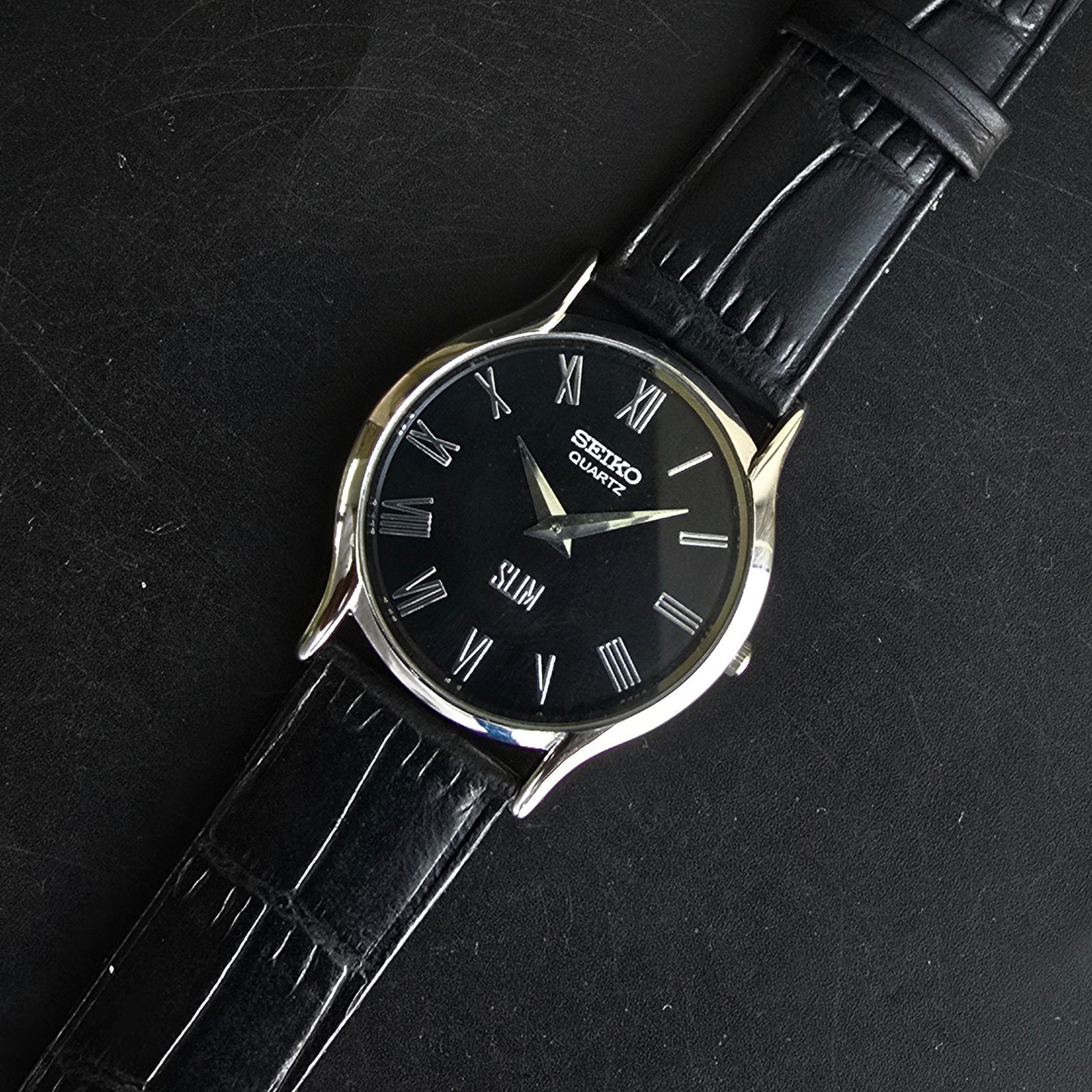 Seiko Slim Round Silver Case black Dial with black strap Men's Watch 